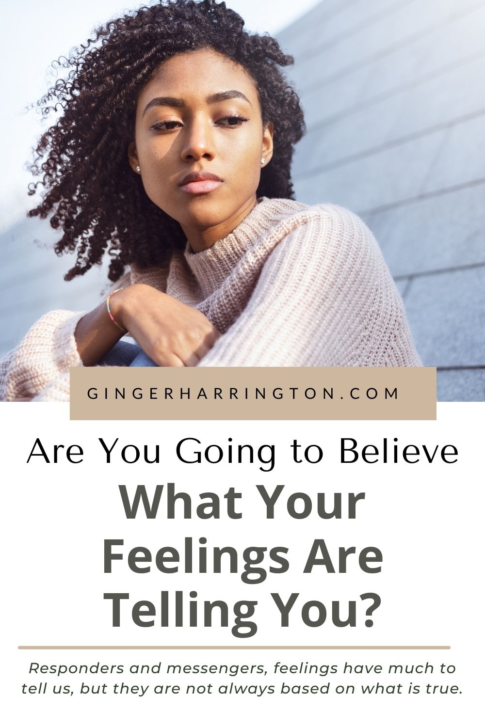 Woman with sad look on face puts arm around her knees illustrating an article on the messages in our feelings.