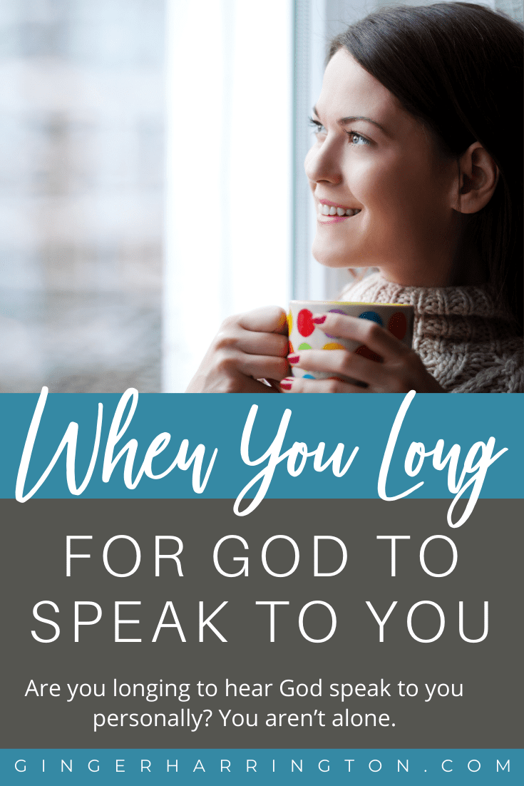 Woman with mug at window illustrates longing to hear God speak to her.