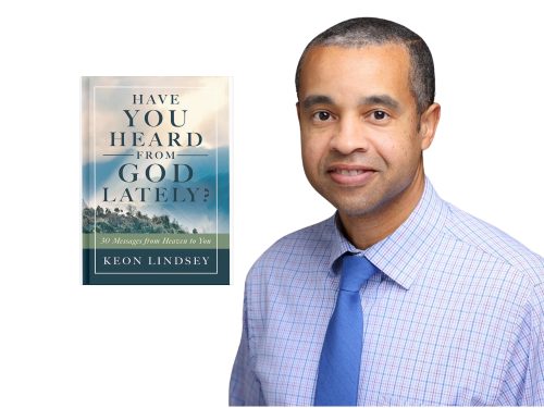 Man in blue shirt, Keon Lindsey with his book Have you heard from God lately?