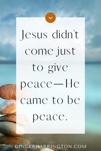 Stacking stones on the beach are background for quote on how Christ is our peace.