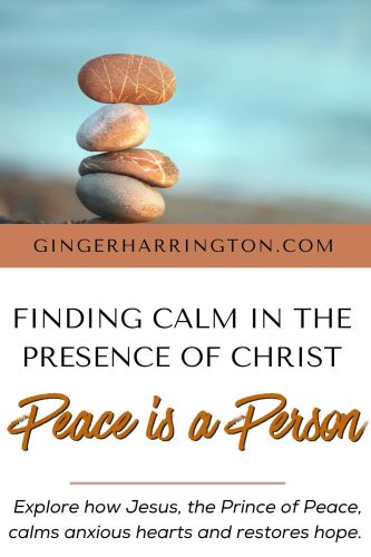 A stack of pepples against the ocean illustrate a post on Christ as our Prince of Peace